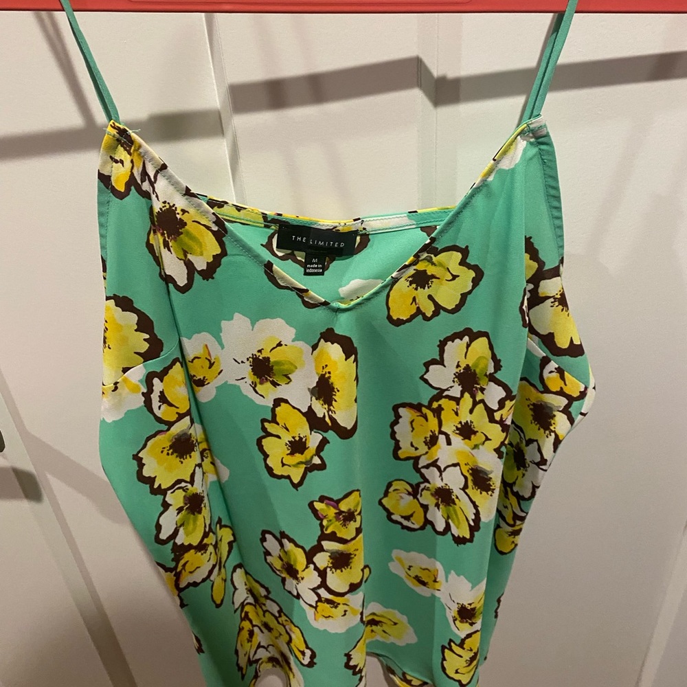 The limited dressy tank size medium